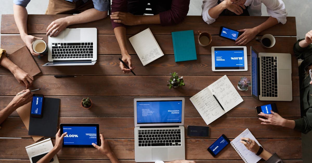 Team collaborating on business strategy and decision-making in a modern office